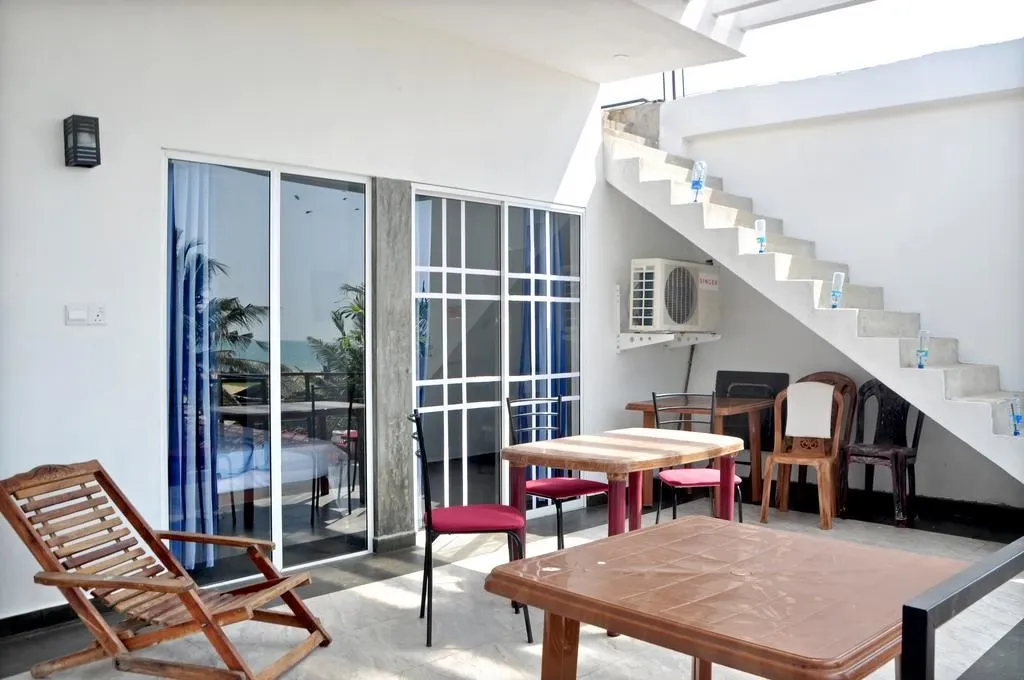 Double room interior with large bed and clean linens