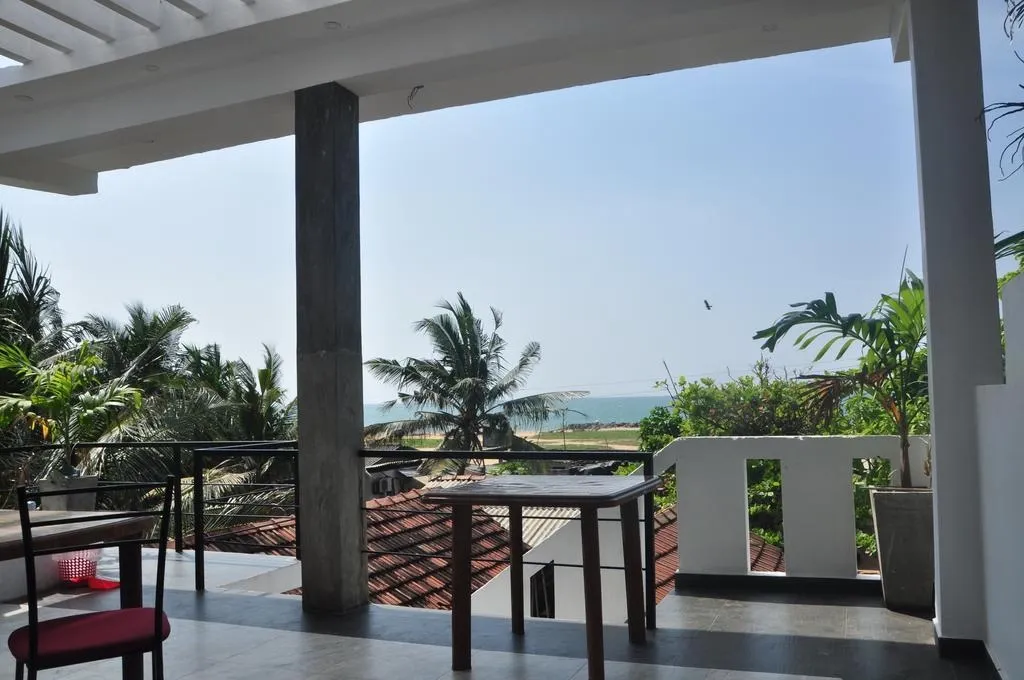 Outdoor dining terrace with wooden furniture